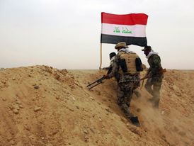 Irácké ozbrojené síly u jezera Tartar bojující proti IS.