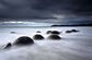 Hladkost: Moeraki Boulders jsou neobvykle velké sférické balvany, které leží podél pláže Koekohe na Novém Zélandu. Vyfotografoval je David Simiele.