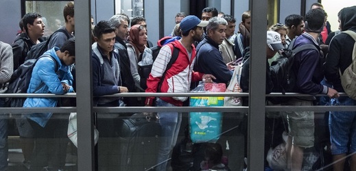 Migranti na nádraží v Mnichově.