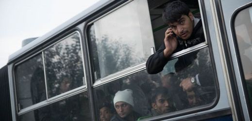 Uprchlíci v autobusu.