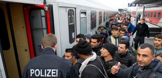 Uprchlíci na cestě do Německa.