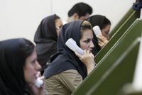 Ženy v Teheránu pracující jako burzovní makléřky.