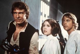 Čtvrtý díl Hvězdných válek s názvem Nová naděje. Zleva Harrison Ford, Carrie Fisher a Mark Hamill.