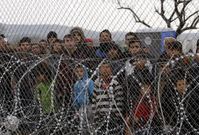 Uprchlíci čekající na makedonsko-řecké hranici.