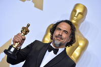 Inárritu s Oscarem za nejlepší režii k filmu Revenant Zmrtvýchvstání.