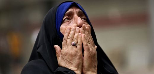 Smutek ženy v Bagdádu.