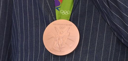 Olympijská medaile - znamení sportovního úspěchu.