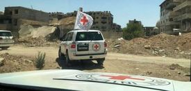 Humanitární auta OSN přivážející do Sýrie materiál.