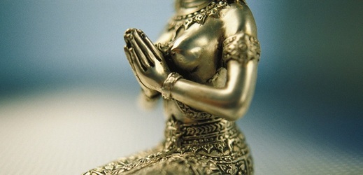 Modlící se soška. 