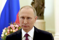 Vladimir Putin před projevem k MDŽ. 