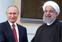 Íránský prezident Hasan Rúhání (vpravo) a jeho ruský protějšek Vladimir Putin.