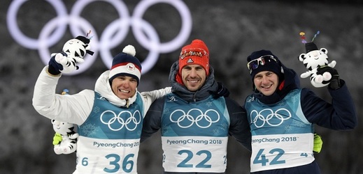 Biatlonista Michal Krčmář a jeho radost ze stříbrné medaile na olympijských hrách.