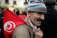 Muž s vlaječkou Tuniska (ilustrační foto). 