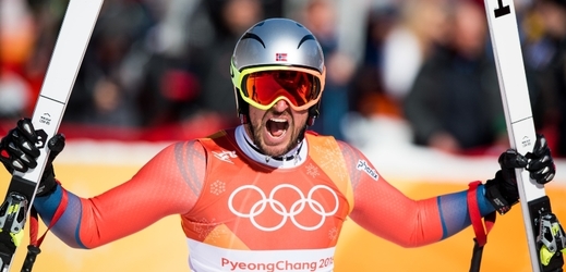 Aksel Lund Svindal slaví olympijský triumf.