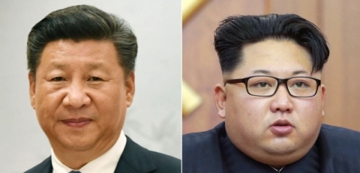 Si Ťin-Pching (vlevo) a Kim Čong-Un.