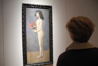 Obraz španělského malíře Pabla Picassa Dívka s květinovým košem.