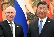 Putin bude tento týden na státní návštěvě Číny, kde se setká se Si Ťin-pchingem