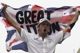 Jenson Button slaví titul mistra světa ve formuli 1.