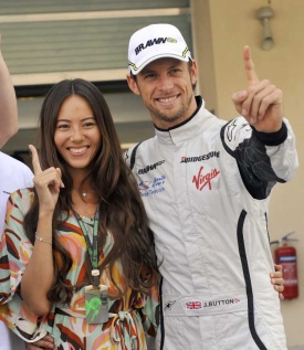 Nový mistr světa formule 1 Brit Jenson Button s přítelkyní.