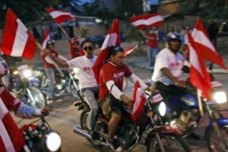 Volby v Hondurasu a fanoušci liberála Santose.