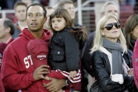Tiger Woods s manželkou a dcerkou.