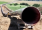 Ocelouvou rouru pro plynovod položili v polích poblíž Giessenu v Severním Porýní-Vestfálsku. (Foto: ČTK/AP)
