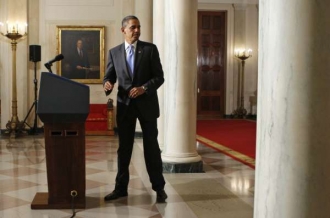 Obama ve Velkém foyer Bílého domu.