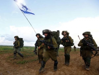 Izraelští vojáci se vracejí z Gazy.