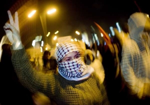 Palestinka demonstrující v Jeruzalémě.