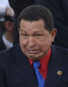Obličej Huga Cháveze na vojenské přehlídce po inauguraci Luga.