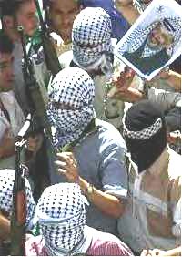 Teroristé útočili jako fedájíni (foto palestinských fedájínů).