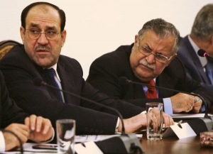 Premiér Málikí (vlevo) se pokusí prosadit dohodu s USA do konce roku.