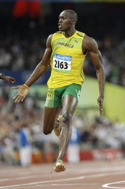 Usain Bolt během olympijského finále.