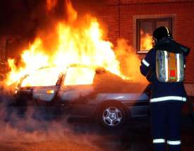 Hořící auta v kodaňské čtvrti Norrebro, 15. února 2008