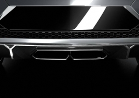 V celé své kráse se nové Lamborghini odhalí až prvního října. Zatím lze z této fotografie vyčíst jen tvar výfuků a zadního difuzoru. 