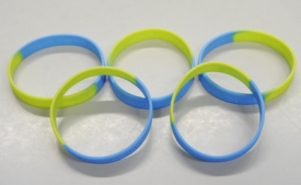 Silikonové náramky pro německé olympioniky.
