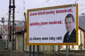Billboard karikující Jiřího Čunka.