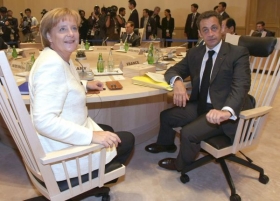 Sarkozy a Merkelová na summitu G8 v Japonsku.
