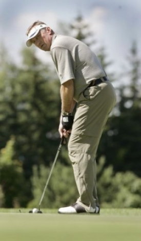 Premiér Topolánek na oblíbeném golfu.
