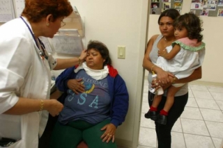 Pacientka bez pojištění v Open Door Health Center, Florida.